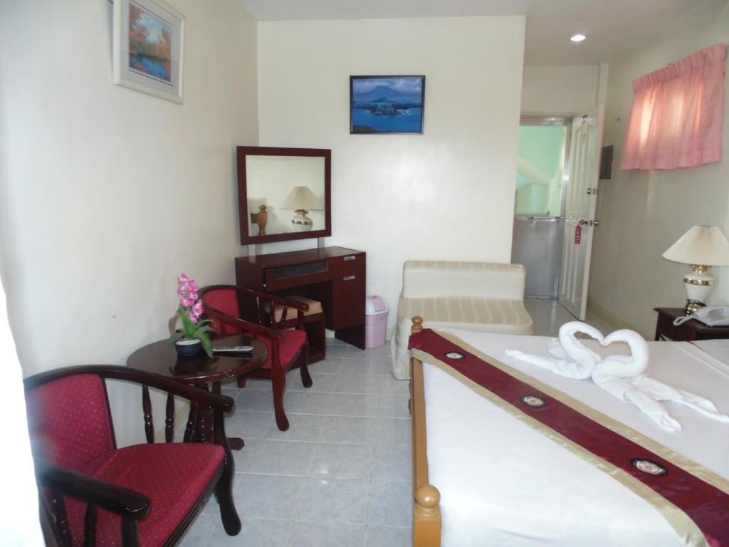טגאיטאי Royal Taal Inn חדר תמונה