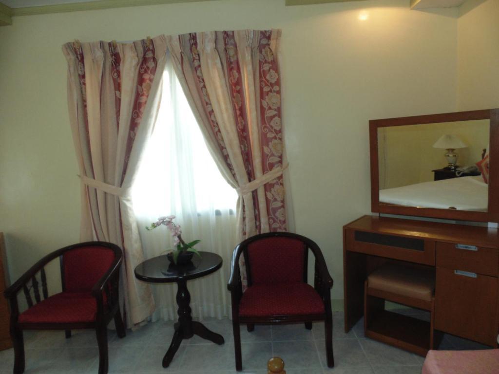 טגאיטאי Royal Taal Inn חדר תמונה