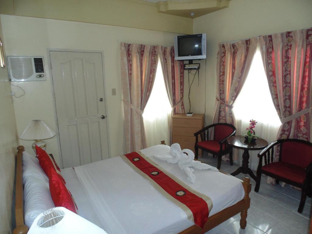 טגאיטאי Royal Taal Inn חדר תמונה